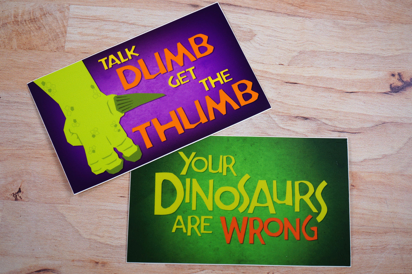 Talk Dumb Get the Thumb Iguanodon 5"x3" Sticker