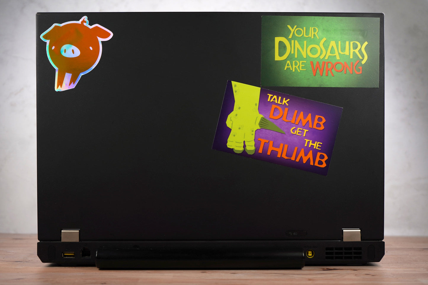 Talk Dumb Get the Thumb Iguanodon 5"x3" Sticker